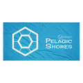 Blue beach towel with white Pelagic Shores logo.