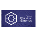 Dark blue beach towel with white Pelagic Shores logo.