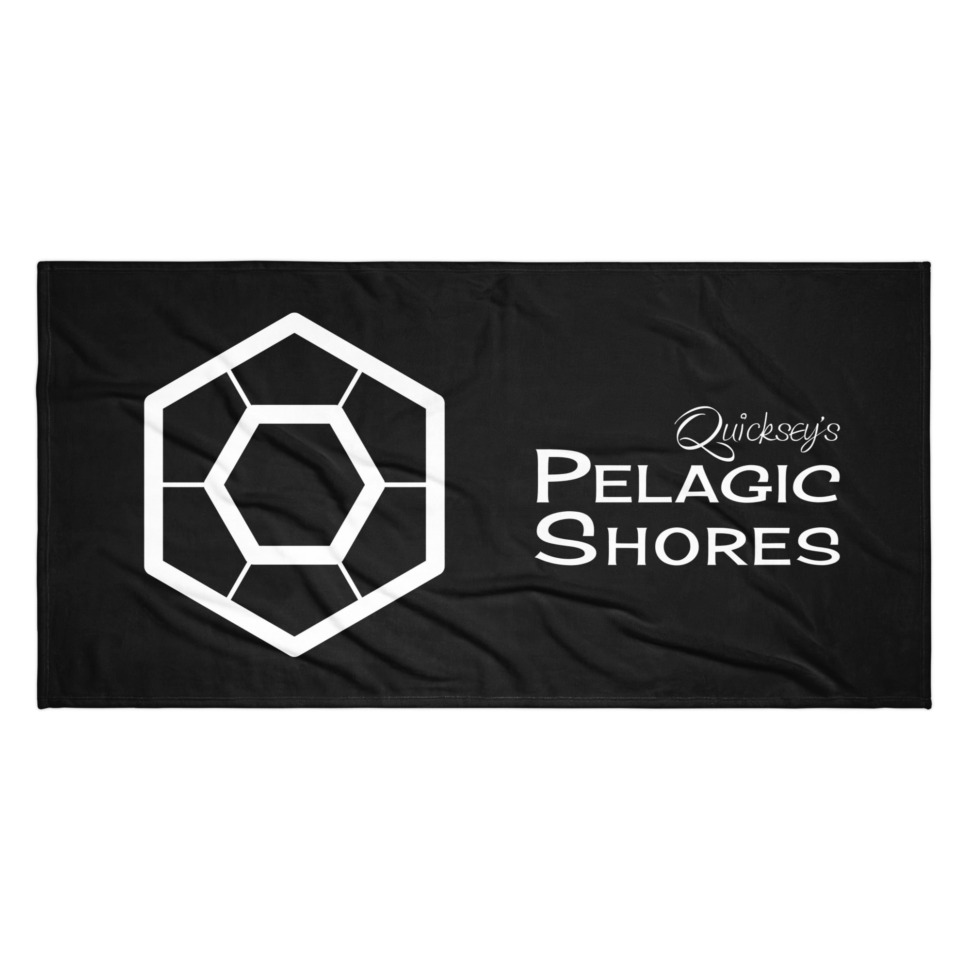 Black towel with white logo and text that says ‘Quicksey’s Pelagic Shores'