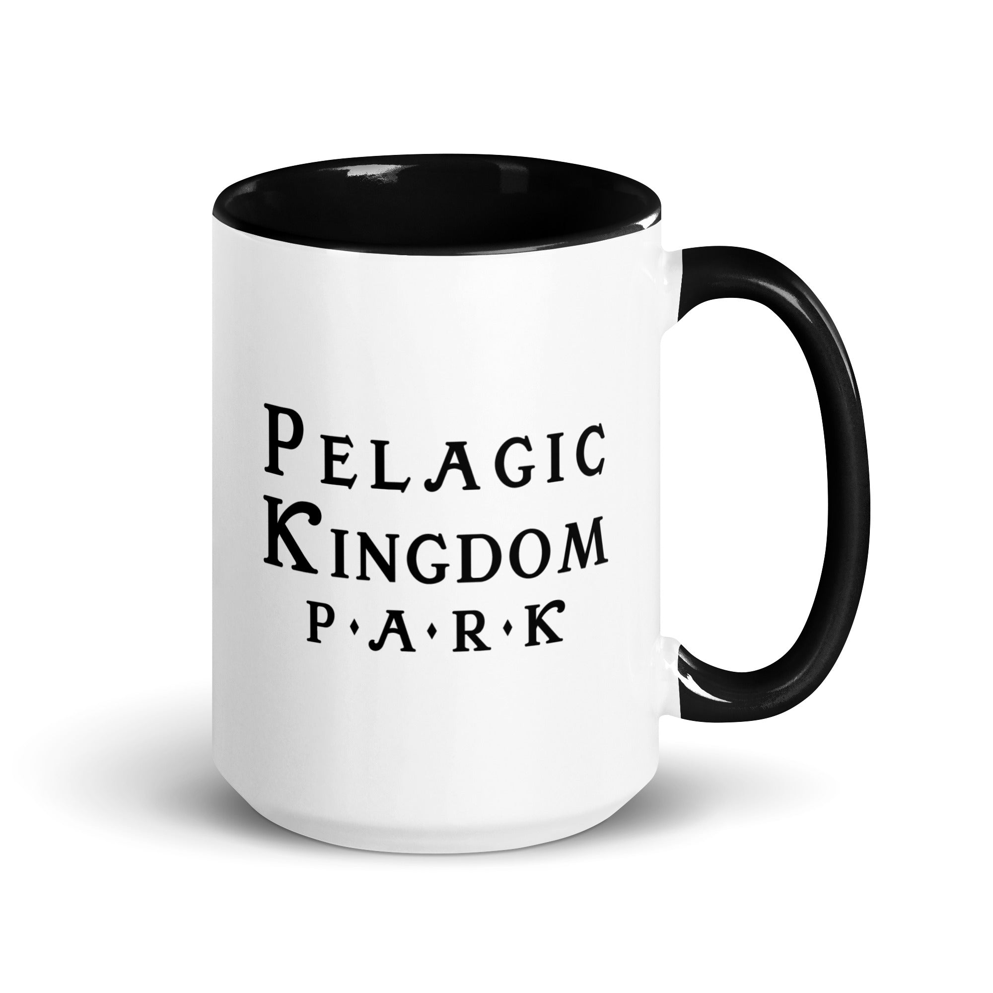 White ceramic mug with black inside and black handle and a black Pelagic Kingdom Park logo on the outside.