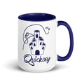 White mug with dark blue interior and handle featuring a castle design and Quicksey logo.