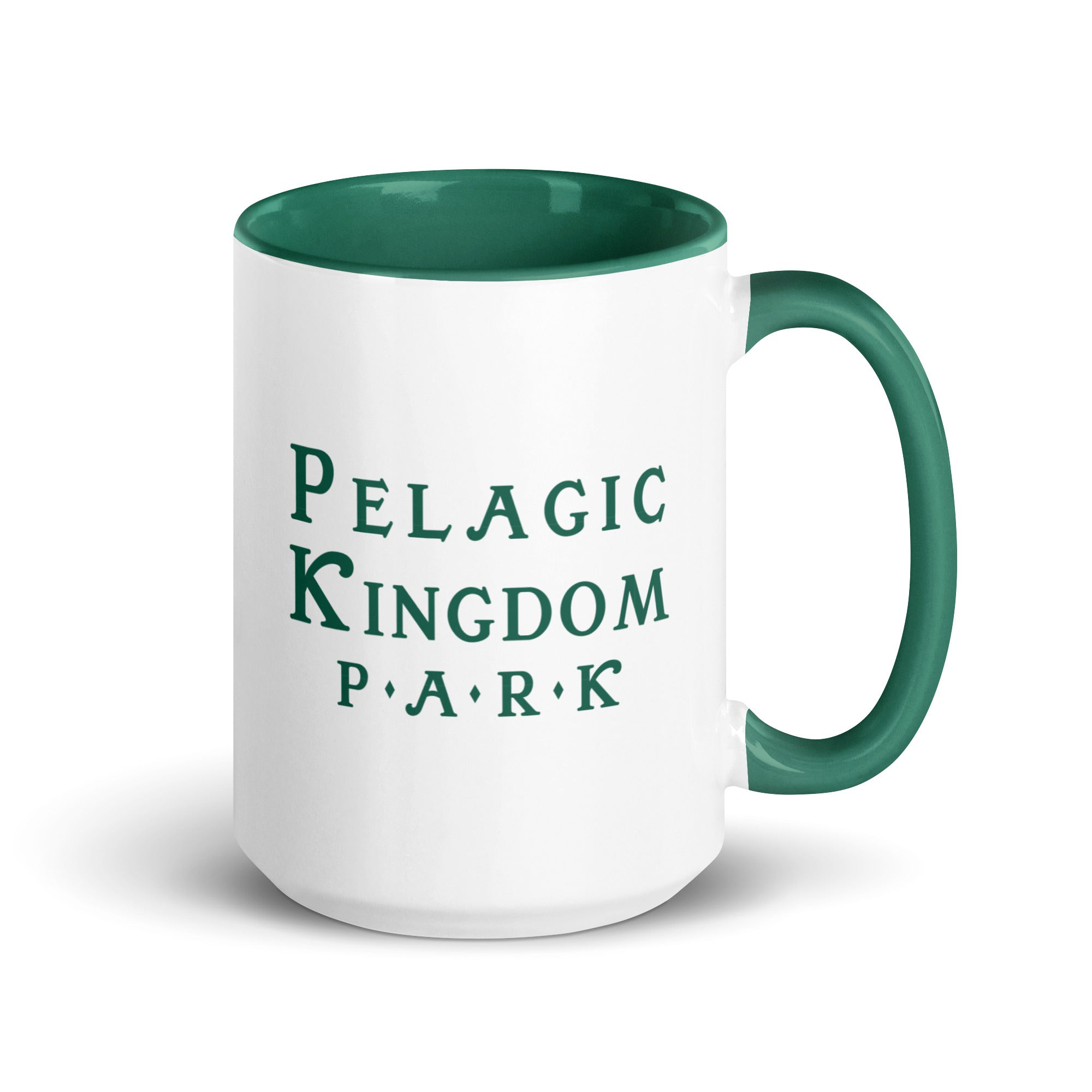 White ceramic mug with dark green inside and dark green handle and a dark green Pelagic Kingdom Park logo on the outside.